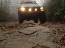rocky path

1993 Jeep cherokee with Bushwacker cutout fenders, 3" lift, 1" spidertrax adapters, rubicon wheels, yakima roof rack, rotopax mounts, hela lights
