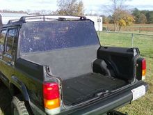 the finished product, 1/8" sheet metal and 1/4 plexi glass, also factory side panels clean it up nice