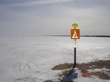 What? you can't read, it says no Camping!  Watch those nasty frozen water currents, they might thaw by July and then getcha!