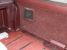 Behind back seat