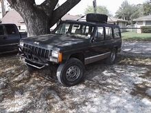 In the school parking lot, Parked next the the tree. With my 35's Buck shot maxxis mudders.