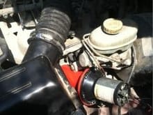 Replaced the stock airbox(after my other intake setup became a bad idea) and relocated the horn.