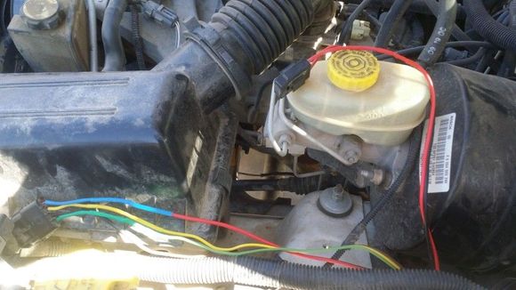 Soldering in the connector to the wires coming from the engine bay