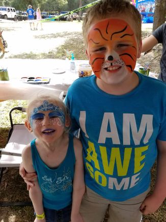 Izzie n Dyllon got their faces painted. Jordan wanted no part of it.
