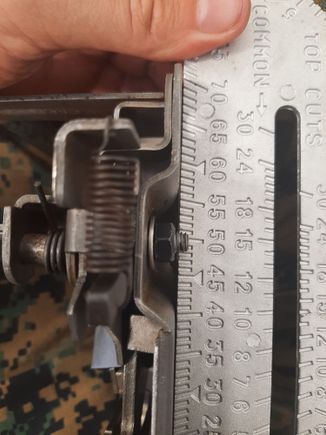 I had to trim the bolt to sit flush against the footwell. (Sorry i didnt get a picture of it afterwards, but you get the point)
