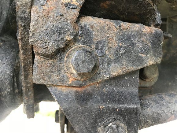 The replacement 7/16” bolt on my old XJ’s front axle. This Jeep had a drop bracket for the stock track bar, which was later removed to install an adjustable track bar. 