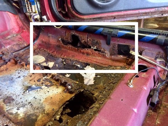 Passenger Side: Rust goes halfway up the door jamb.