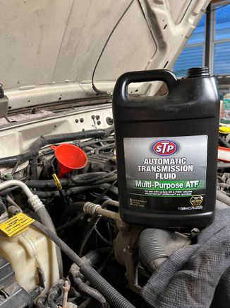 Adding transmission fluid 