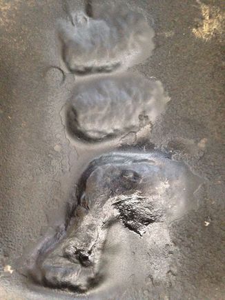 Pistol shaped dent about 1" deep, other 2 about 1/4-1/2".