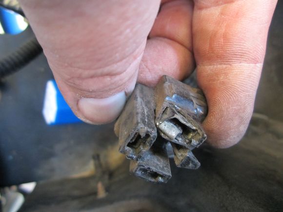 This was one of my headlight plugs prior to the headlight harness install.