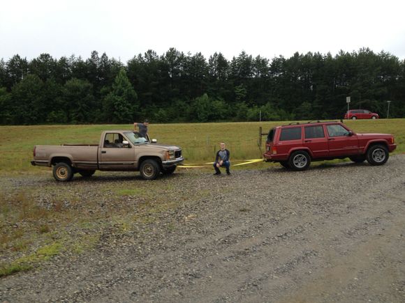 Rescuing an Appalachian farm boy and his newly bought (sad) GM truck (the farm boy is the one by the pickup truck).  The young man on the tow line is my son Spencer, a Combat Engineer in the U.S. Army).