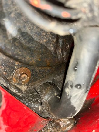 This is at the bottom of the blower motor housing. I tried covering most of this area with black silicone RTV sealant.