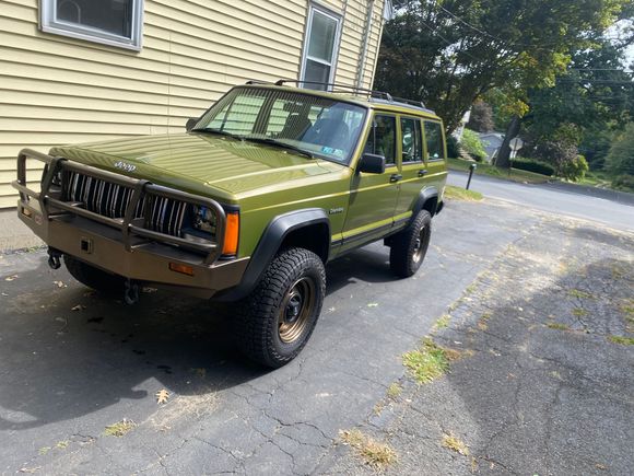 Stock wheels same tires with 1.25 inch spacers will -19mm with 3.75 backspacing look anything like this?