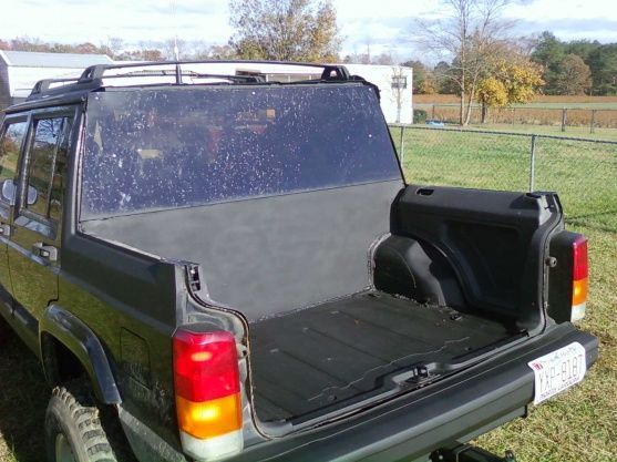 the finished product, 1/8" sheet metal and 1/4 plexi glass, also factory side panels clean it up nice