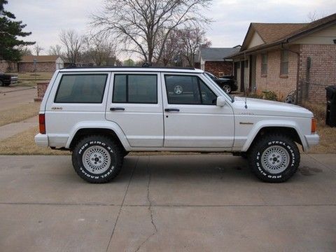 The Jeep as it sits. 2" BB lift, new motor and basically stock for now.