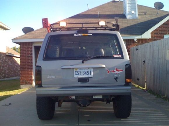 put lights on the back of rack..nice when dark and on the trail.  They turn on auto with the reverse lights and there is a switch.  Just a hint...if you ever tint your tails...tape off the reverse light section..oops