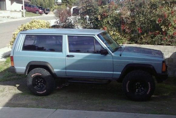 jeep sitting in the yard 2