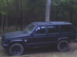 painted flat black with spray cans. if you do it right it looks good.