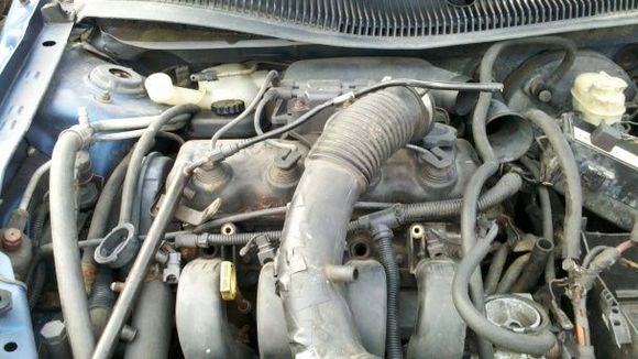1995 Dodge Neon junkyard donor that provided me with some hot new fuel injectors.