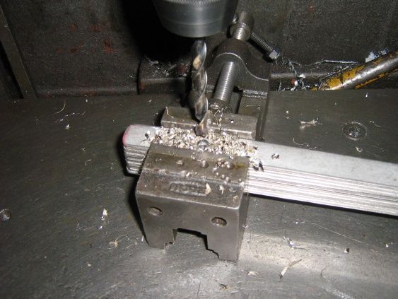 Secure your work and back grind your bit webb to relieve chips