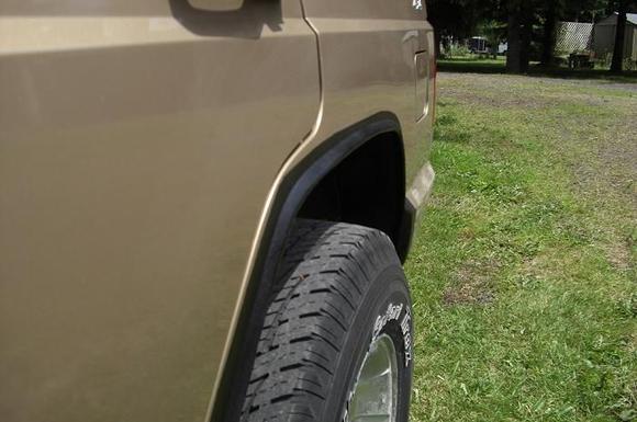 My Rear fenders cut and fold job w/ Rhino liner