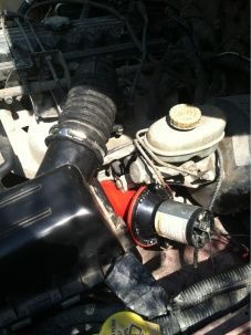 Replaced the stock airbox(after my other intake setup became a bad idea) and relocated the horn.