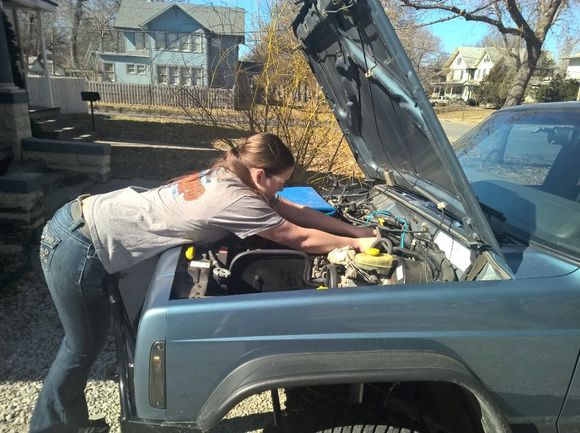 Girl gettin' it done. 4 hole injectors here we come.