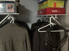 The closet has shelves and coat hangers for our off season coats. Done! 