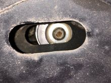 That bolt head, it should be in the middle of the slotted hole