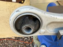 Worn out rear bushing from Moog arm that was removed from the 2008 years ago.  I kept these as extras.  