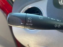 This is the default setting of the light switch. The dash lights should dim or brighten based on ambient light.