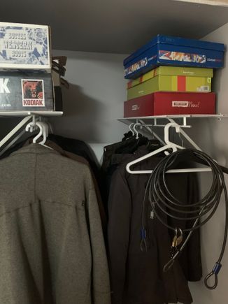 The closet has shelves and coat hangers for our off season coats. Done! 