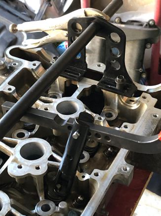 Used this handy tool to compress the valve springs then remove the valve keepers
Then installed new seals and valves and used the tool again to reinstall the keepers