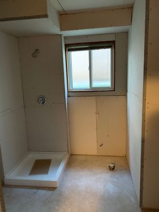 Shower and toilet area, done, except corner bead