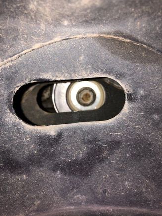 That bolt head, it should be in the middle of the slotted hole