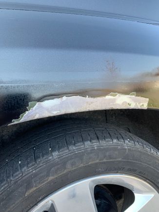 The sheet metal looks good no rust holes. Just loose bubbled paint. This is a photo after a coat of the rust converter 