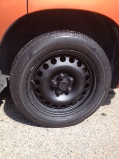 Center cap cut from Malibu wheel cover painted flat black matched wheels. $20 for 4 economy upgrade?