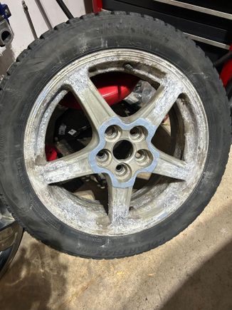 Aluminium Pontiac G6 rims lurking underneath those plastic fantastic caps.