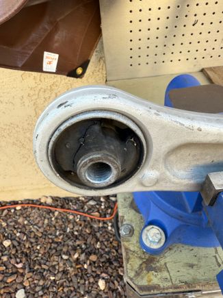 Worn out rear bushing from Moog arm that was removed from the 2008 years ago.  I kept these as extras.  