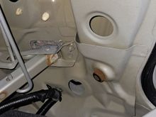 Pic taken inside trunk from entering back seat. Can see water drop coming from square by hinge.
