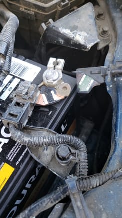 I broke this off but car still runs. How do I fix it? Help! 2013 Honda civic from the negative battery side.