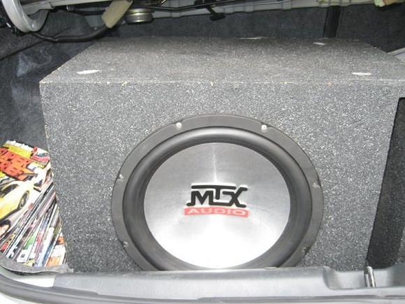 MTX Thunder 7500 12" 
Custom Built Box
Sony 1200 Amp