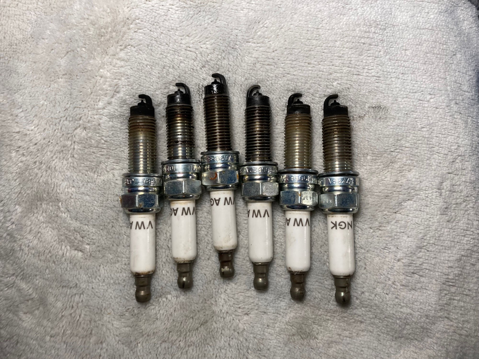 Factory set, last time this engine was run it was in a crashed car cold started and 15 seconds after start bring bounced off the soft limiter.....so they all look rich AF. 