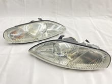 Nice condition late headlights (signified by the larger/improved moisture breather ports)