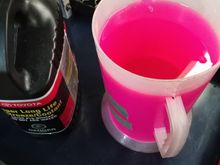 I have put new" freshly squeeze" pink coolant in measuring bin just to compare how much was before.