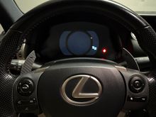 Installed carbon fiber magnetic shifters.