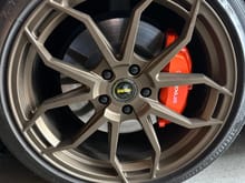 Decided to paint the calipers a metallic orange courtesy of Lamborghini. Neochromatic decal came out great too. Changes colors depending on the angle and light. Going to have custom centercaps to match better. Looks great against caviar and made me love my wheels even more. 
