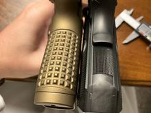 Next to my current carry gun, 15 vs 8 rounds with essentially the same profiles 