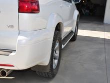 18&quot; Toyota 4Runner LTD rims with Nitto Terra Grapplers in 285/60-18.  Slightly wider stance.  tire is .8&quot; wider than OEM