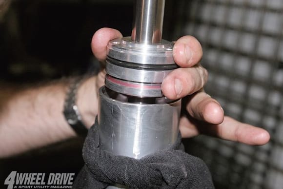 Example of how to insert a shock piston into shock body.